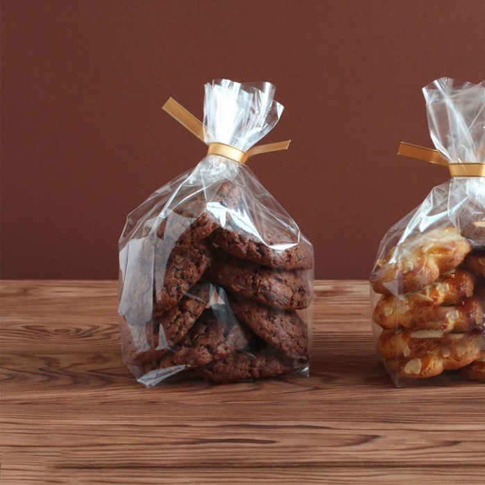 Sacs à biscuits biodégradables en PLA transparent décoratif avec ruban de vente de pâtisserie pour biscuits au chocolat