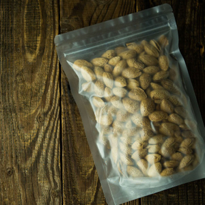 Emballage d'amidon de maïs biodégradable translucide en carbone pour les noix de cajou
