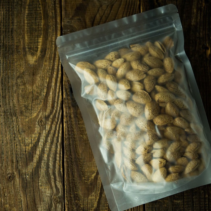 Emballage d'amidon de maïs biodégradable translucide en carbone pour les noix de cajou